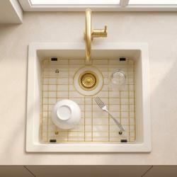 gold-kitchen-sink-grid-with-dishes